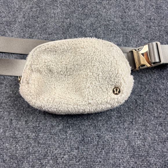 lululemon athletica Handbags - LULULEMON Light Ivory Fleece Sherpa Everywhere Belt Bag One Size